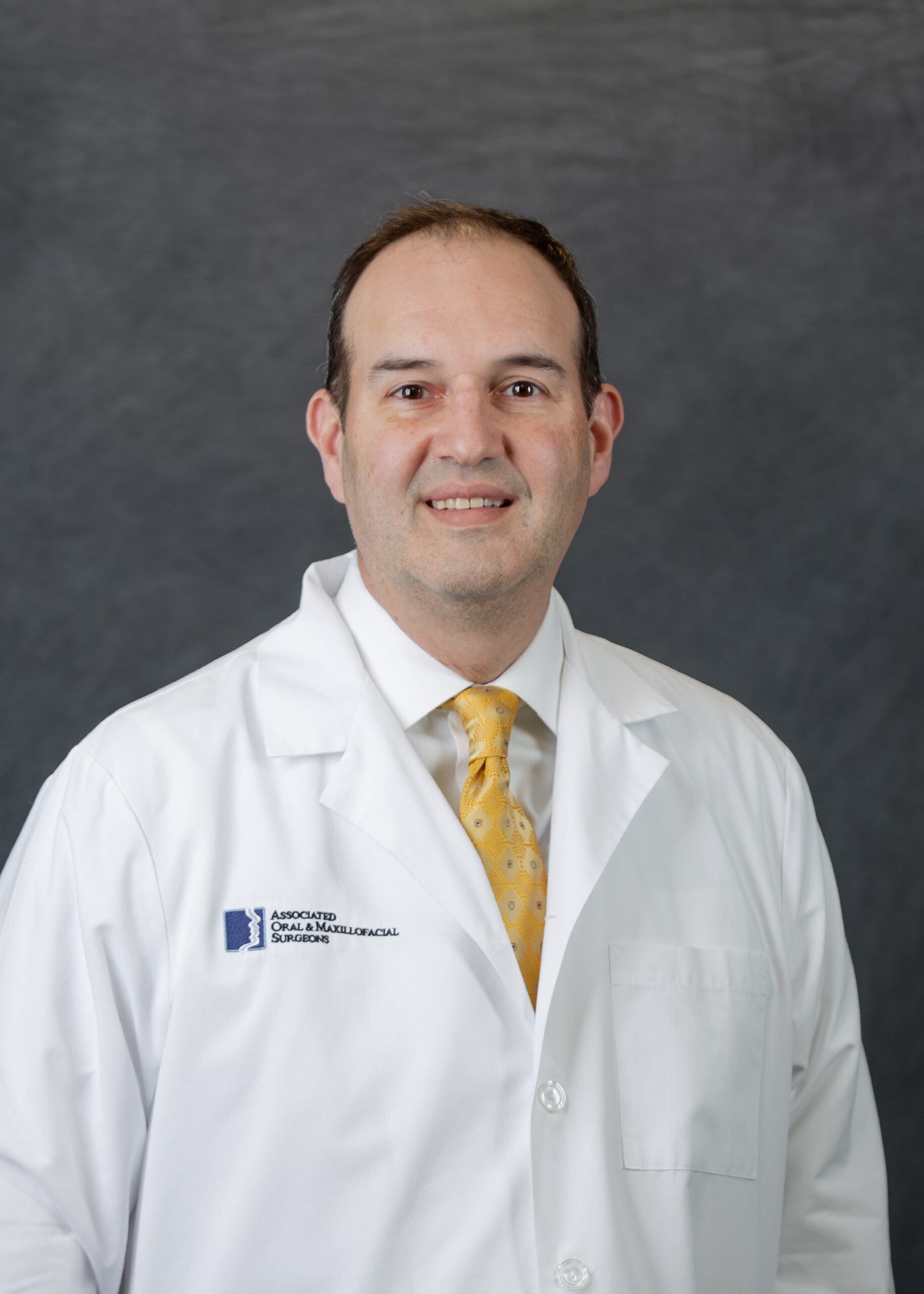 Dr Robert Busch an oral surgeon at Associated Oral and Maxillofacial Surgeons